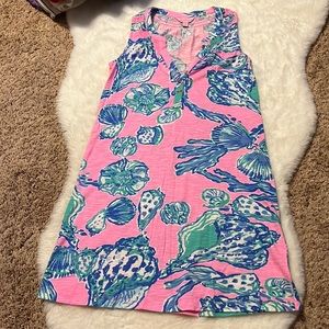 Lilly Pulitzer dress, sleeveless. Comes right above the knee